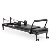 Elina Pilates Nubium Black Edition Reformer, all-black frame, angled studio view