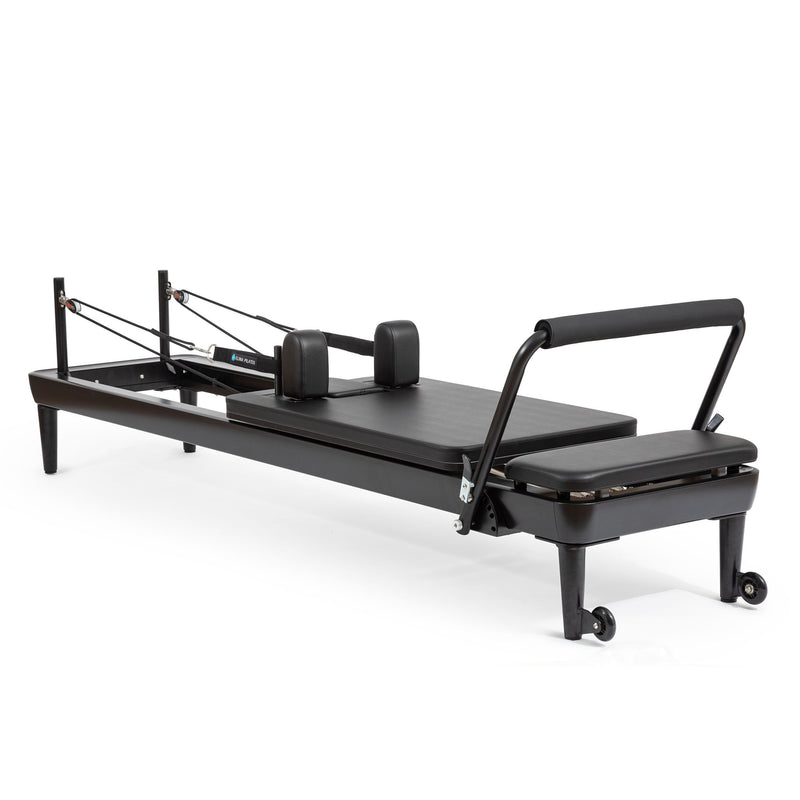 Elina Pilates Nubium Black Edition Reformer, all-black frame, angled studio view