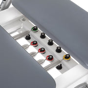 Color-coded springs on the white spring bar, grey pads