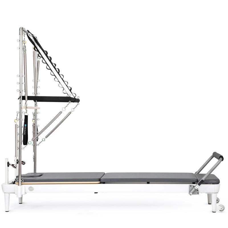Nubium Reformer with Tower side view, grey upholstery