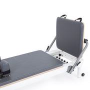 Foot end with the jump board raised showing the spring bar, grey