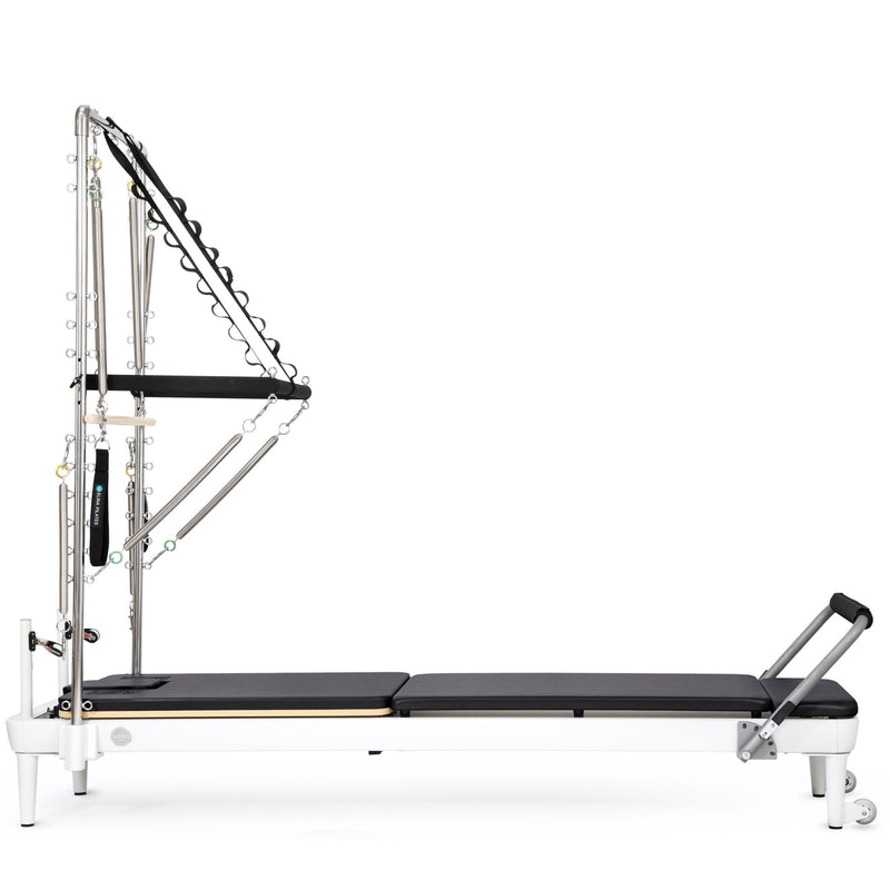 Nubium Reformer with Tower side view, black upholstery, tower springs and bar fitted