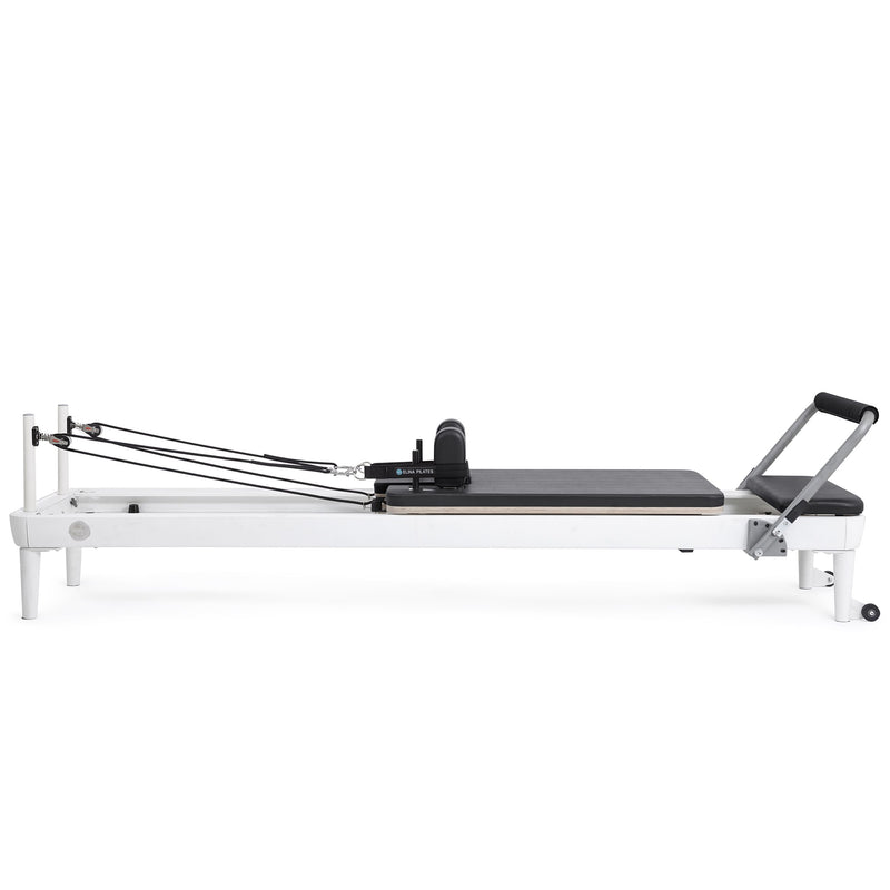 Nubium Reformer side view, black upholstery