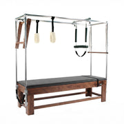 Peak Pilates Artistry Classic Cadillac in walnut, studio view