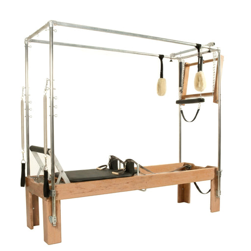 Peak Pilates Artistry Convertible with Vegan Straps in beechwood, angled studio view