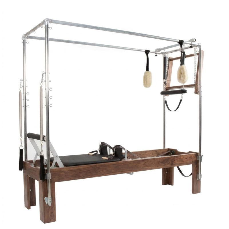 Peak Pilates Artistry Convertible with Vegan Straps in walnut, angled studio view