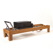Peak Pilates Artistry Reformer with Leather in beechwood, with the Long/Short Box