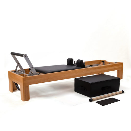 Peak Pilates Artistry Reformer with Leather in beechwood, with the Long/Short Box, short box bar and mat