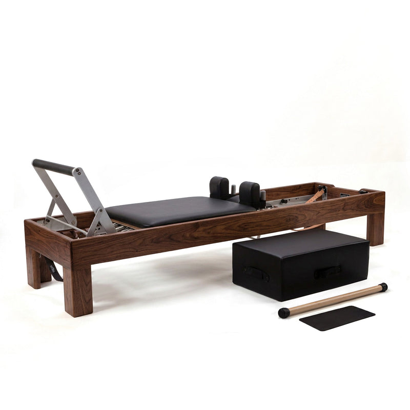 Peak Pilates Artistry Reformer with Leather in walnut, with the Long/Short Box, short box bar and mat