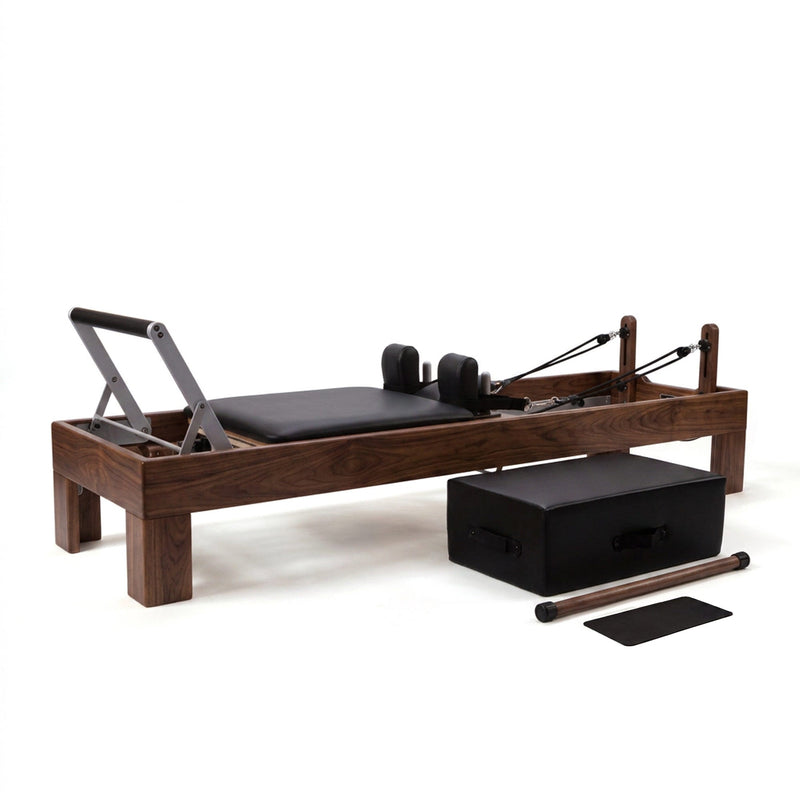 Peak Pilates Artistry Reformer with Rope in walnut, studio view