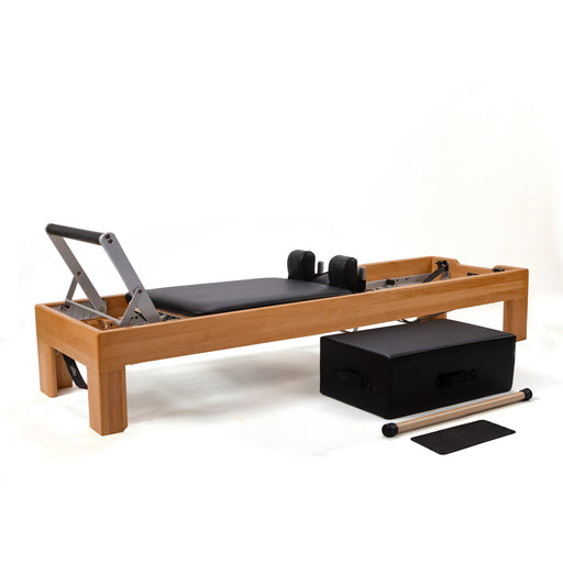 Peak Pilates Artistry Reformer with Vegan Straps in beechwood, with the Long/Short Box, short box bar and mat