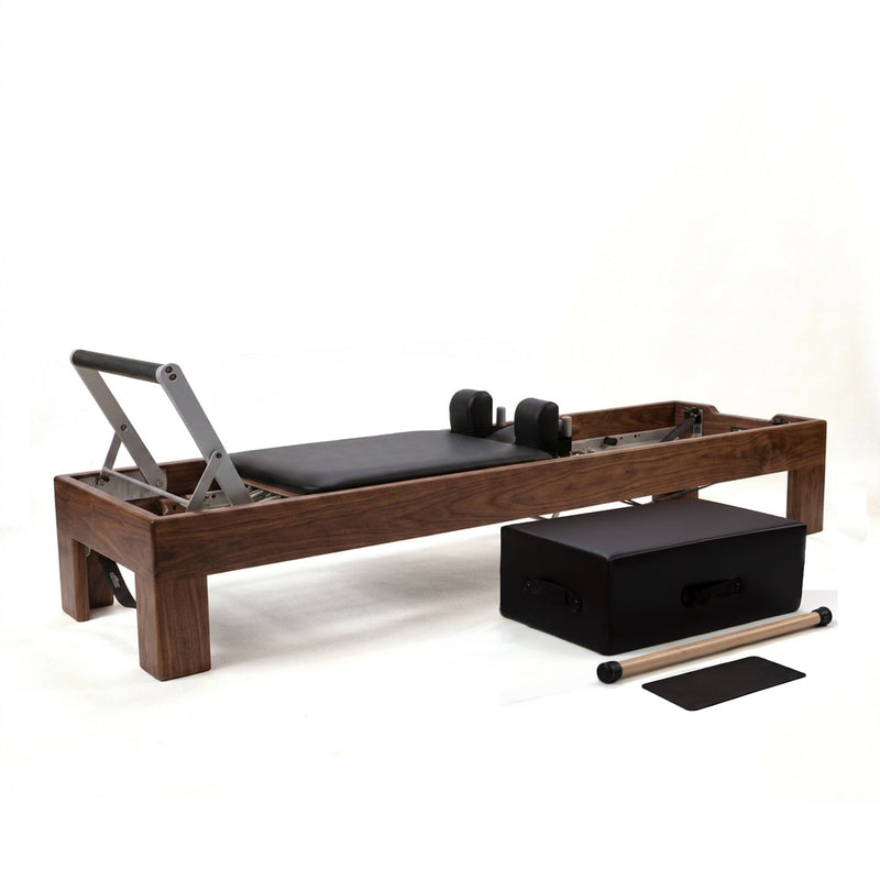 Peak Pilates Artistry Reformer with Vegan Straps in walnut, with the Long/Short Box, short box bar and mat