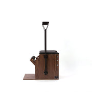 Peak Pilates Artistry Split Pedal Low Chair with Handles & Brackets in walnut, studio view