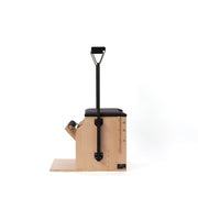 Peak Pilates Artistry Split Pedal Low Chair with Handles & Brackets, studio view