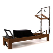 Peak Pilates Artistry TWS with Leather Straps in walnut, studio view
