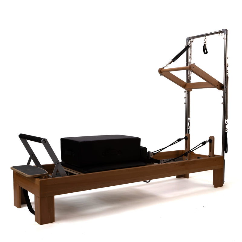 Peak Pilates Artistry TWS with Leather Straps in walnut, studio view