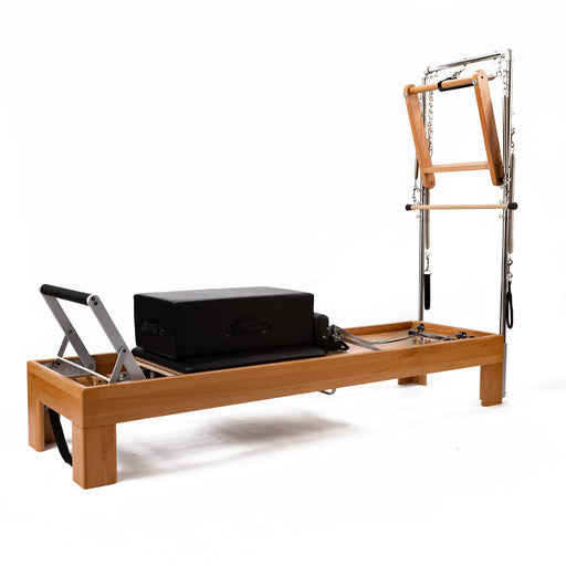 Peak Pilates Artistry TWS with Vegan Straps in beechwood, studio view