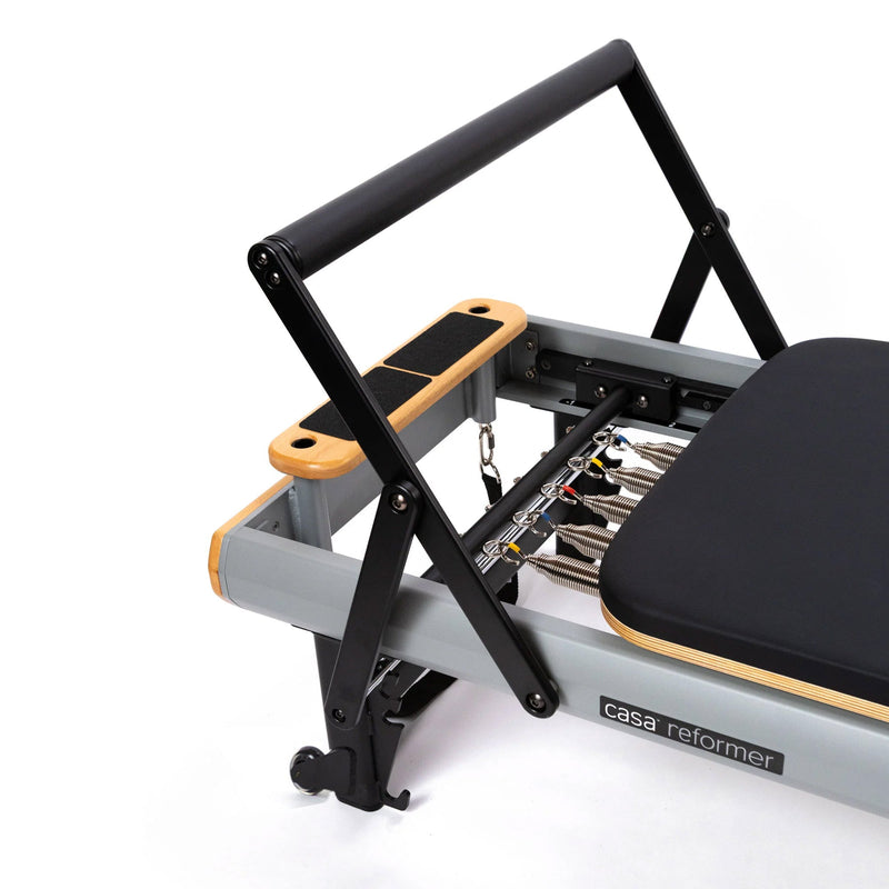 Peak Pilates casa Reformer Bundle, four-position contoured footbar detail