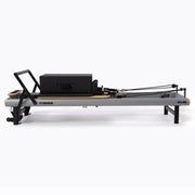 Peak Pilates casa Reformer Bundle, with integrated transport wheels