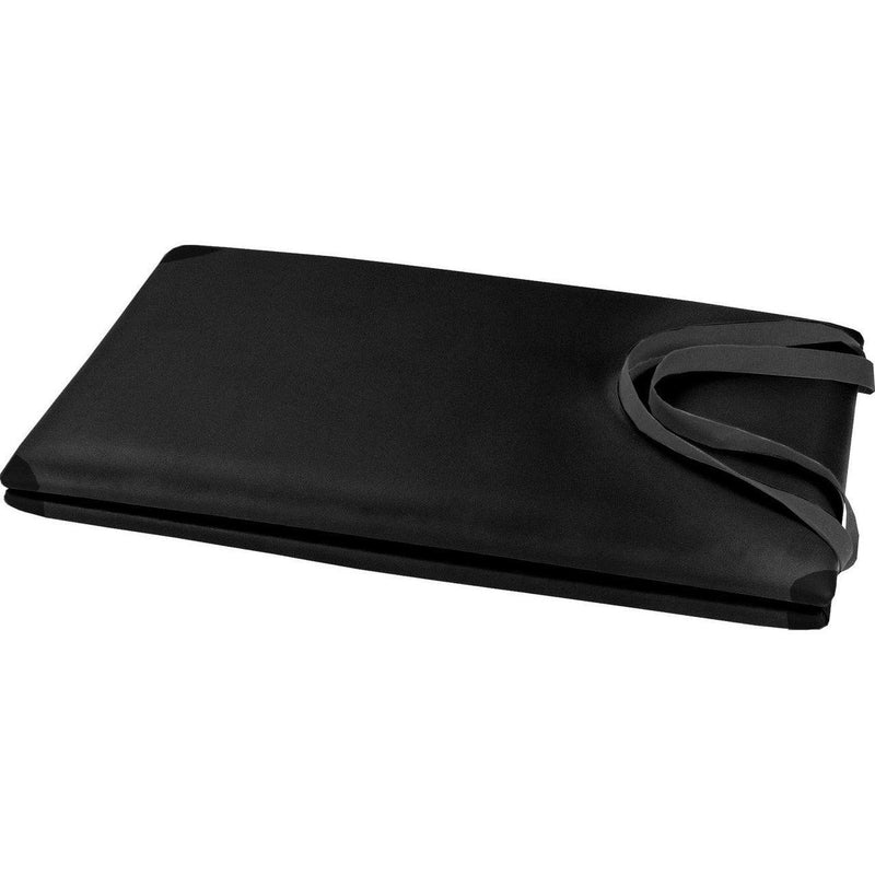 Peak Pilates Folding Platform Mat in black, folded closed with the carry strap visible