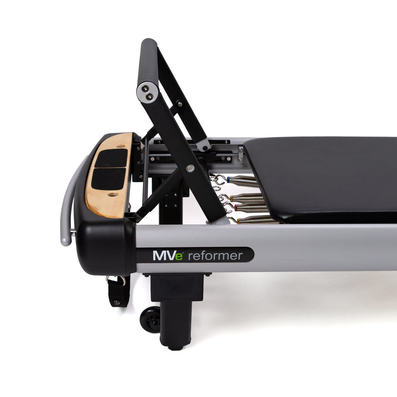 Peak Pilates MVe Reformer Bundle, four-position contoured footbar detail