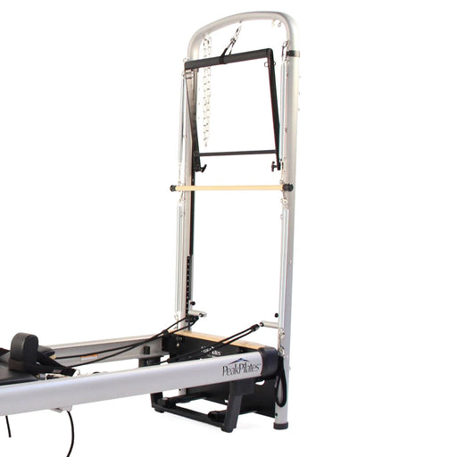 Peak Pilates MVe Reformer Tower Conversion fitted to an MVe Reformer, tower upright in side view