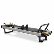 Peak Pilates MVe Reformer with Long/Short Box, angled studio view