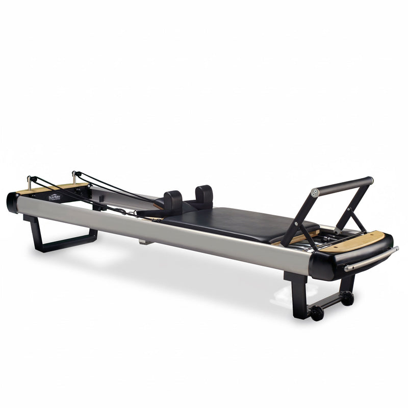 Peak Pilates MVe Reformer with Long/Short Box, angled studio view