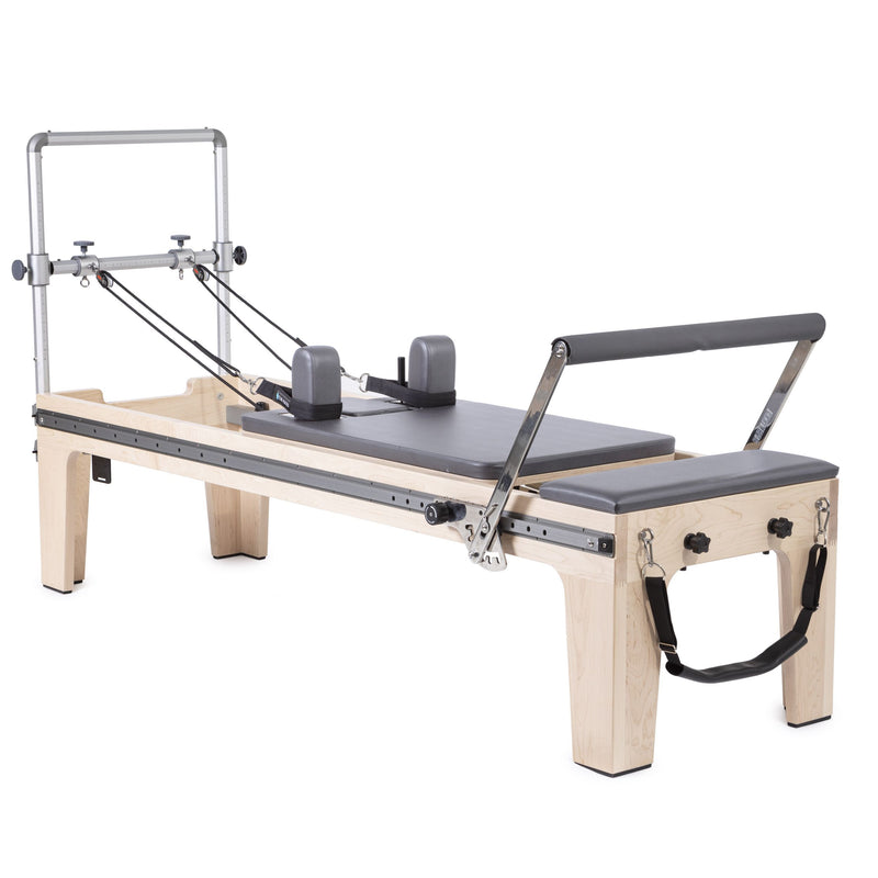 Master Instructor Physio Reformer in grey, angled studio view