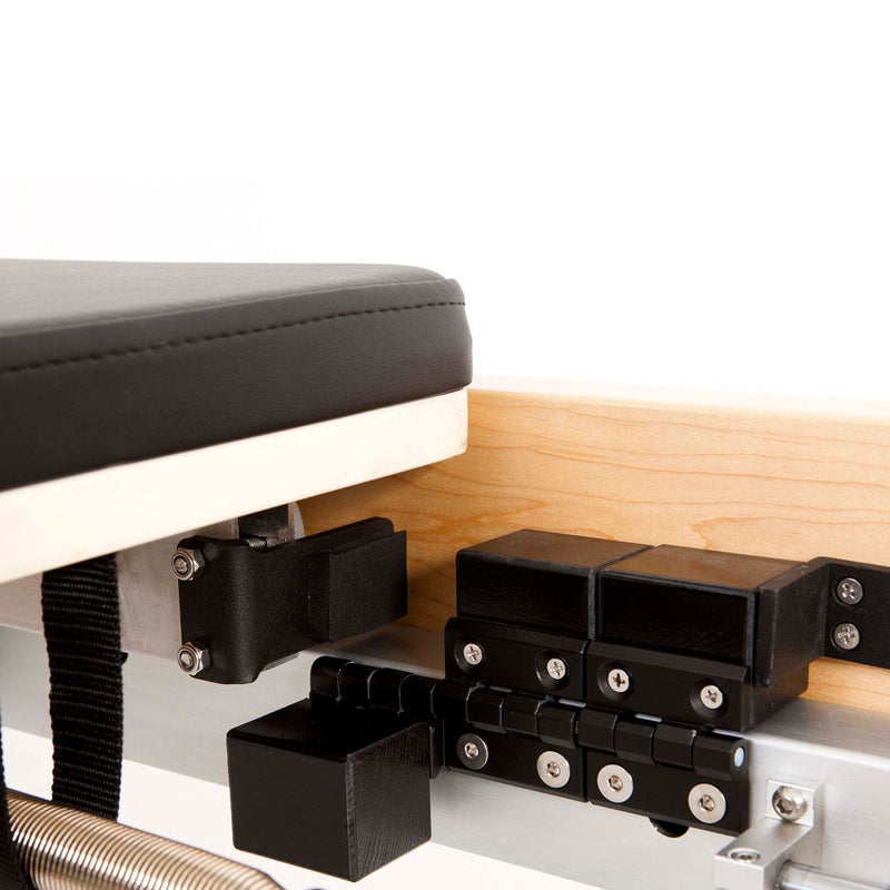 Elina Pilates Physio Wood Reformer, black, carriage stopper detail