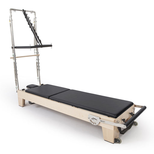 Elina Pilates Elite Wood Reformer with Tower in black, angled studio view