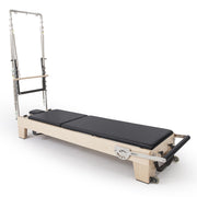Elite Wood Reformer with Tower in black, opposite angle