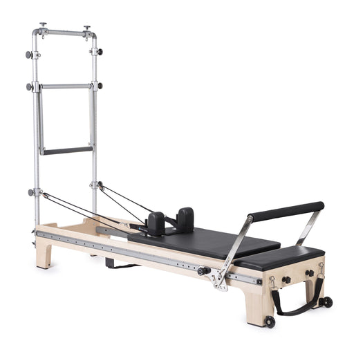 Elina Pilates Master Instructor Reformer with Tower in black, angled studio view
