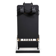 Rear view of the folded Fold Reformer standing upright, black