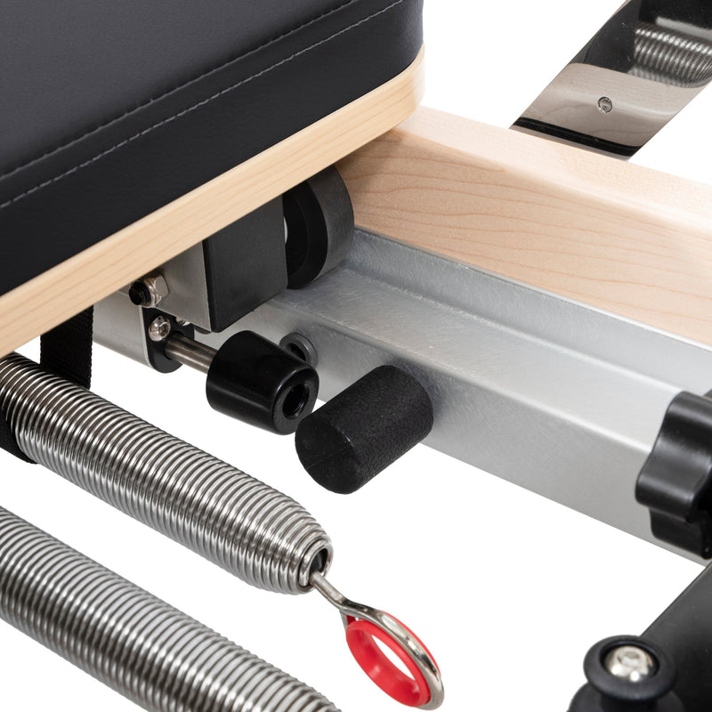 Spring eyelet and carriage stopper under the rail, black
