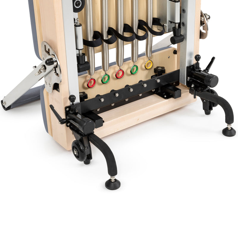 Base of the stored Vertical Reformer: springs, wheels and adjustable feet, grey