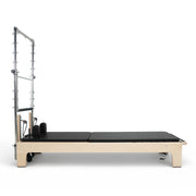 Club Reformer with Tower side view, mat conversion, black