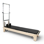 Club Reformer with bare tower frame and mat extended, black