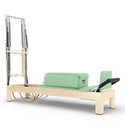 Classic Natural Wood Reformer with Tower in mint green upholstery — made-to-order colourway