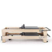 Two Elina Pilates Elite Wood Reformers stacked, grey, alternate view