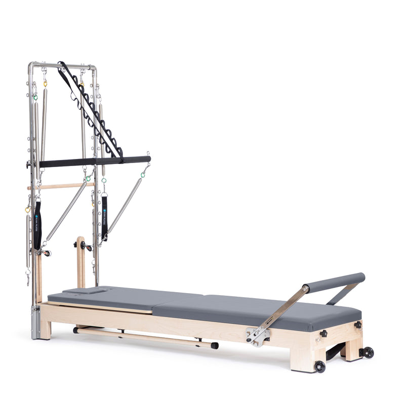 Elina Pilates Lignum Reformer with Tower in grey, angled studio view