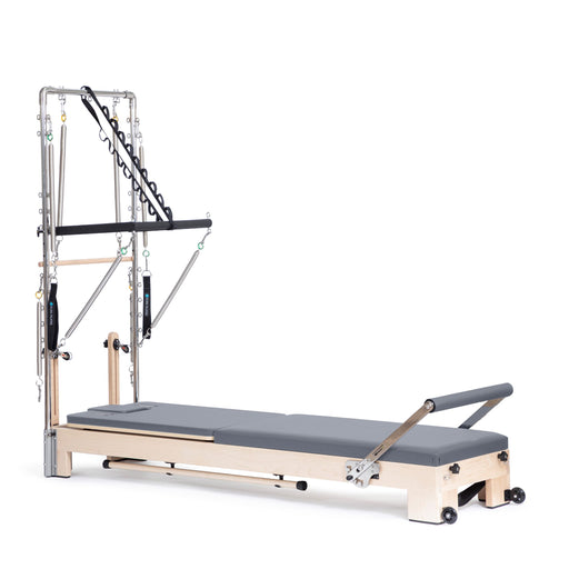 Elina Pilates Lignum Reformer with Tower in grey, angled studio view
