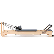 Lignum Reformer with the sitting box on the carriage, grey