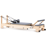 Elina Pilates Lignum Reformer side view, grey upholstery